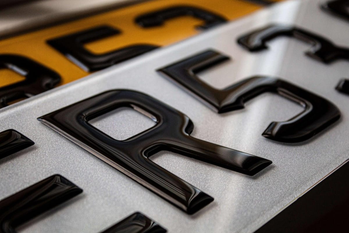 3D gel number plate showing the domed, glossy resin over each character