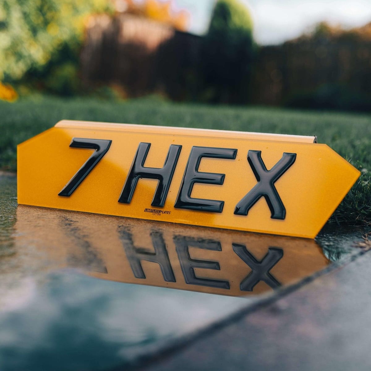 Hex number plate with angled ends on a car bonnet