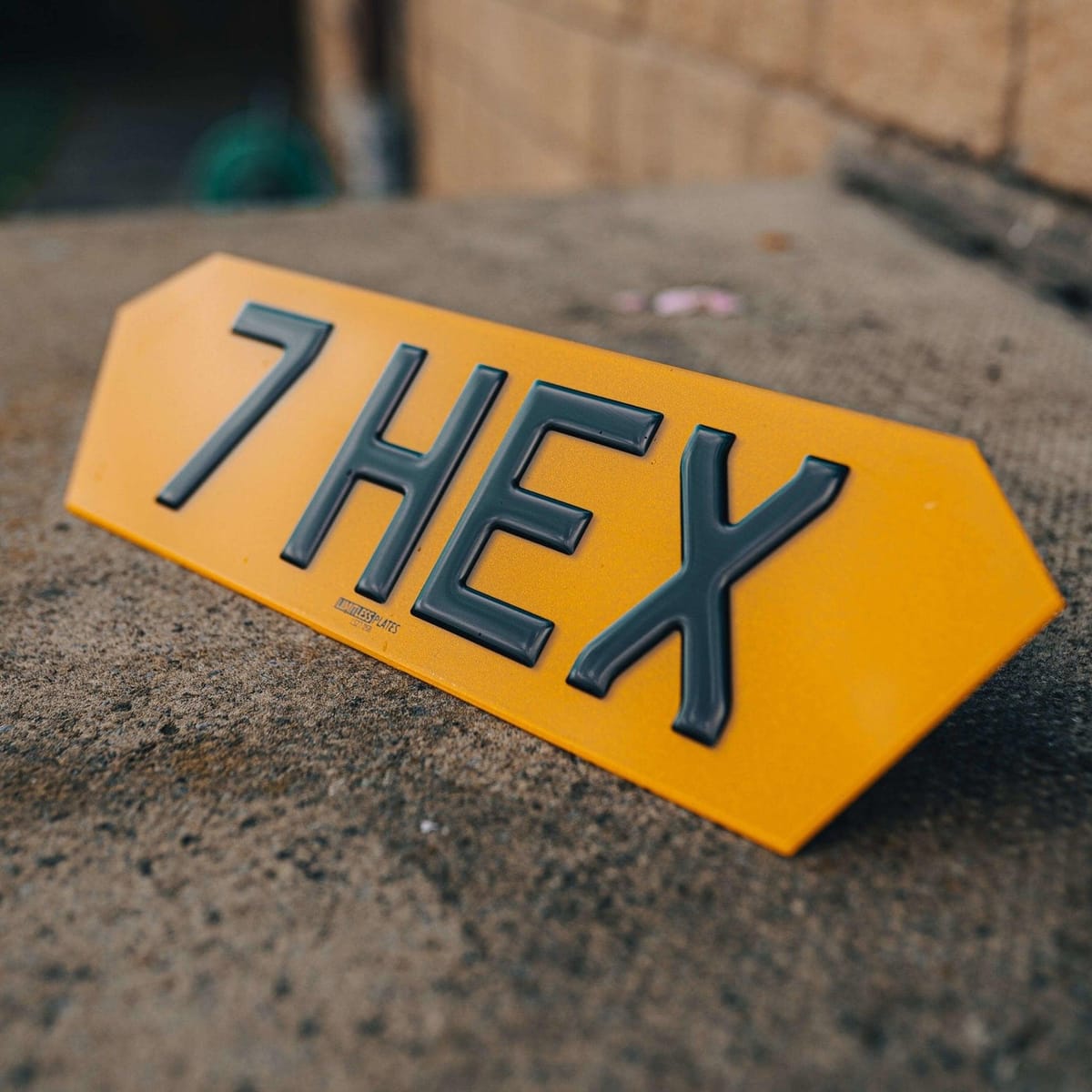 Yellow hex rear number plate with 4D characters