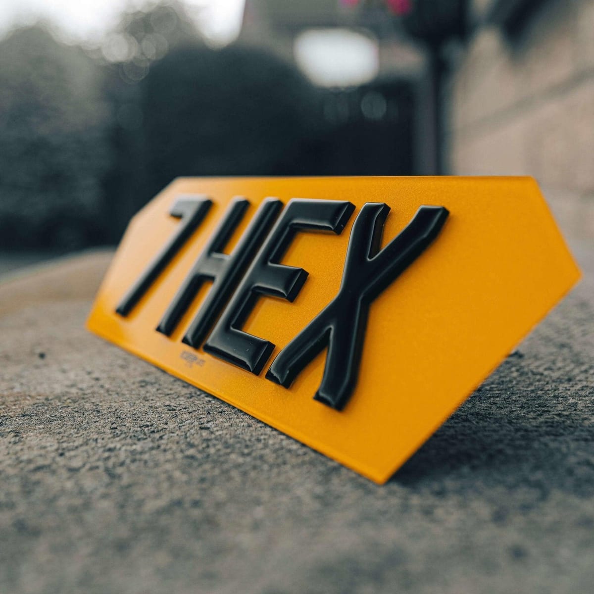 Hex number plate photographed outdoors